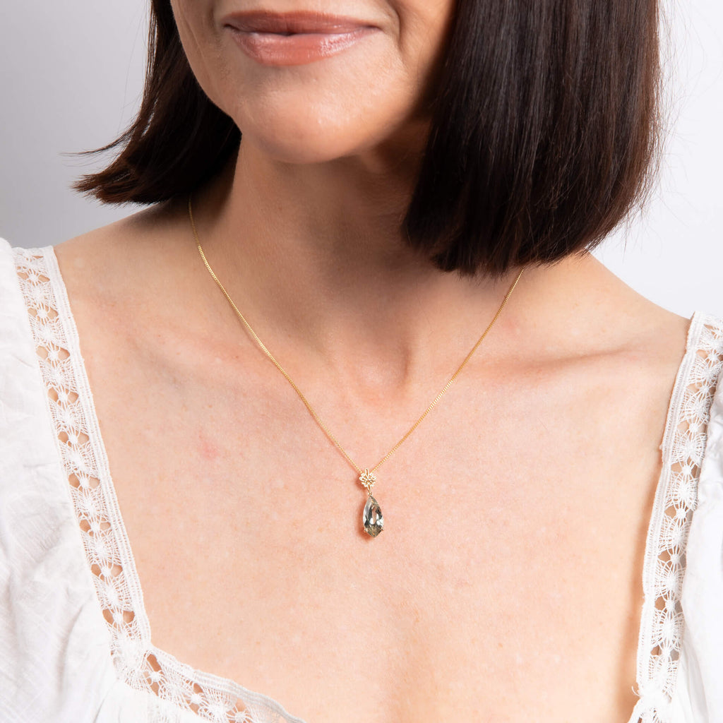 Elements Gold Fancy Cut Green Quartz Drop Pendant with Swirl Detail Bale