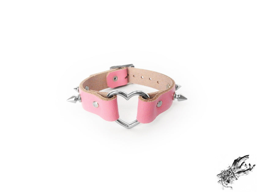 Tobilleras con forma de corazón tachonado rosa