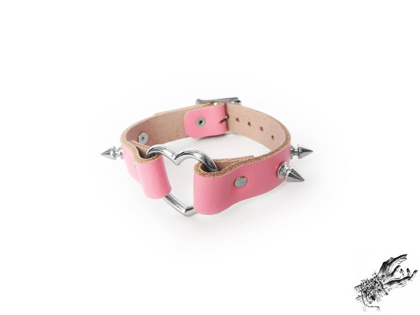 Tobilleras con forma de corazón tachonado rosa
