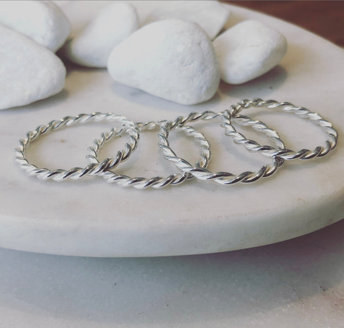 Twisted Stacking Rings