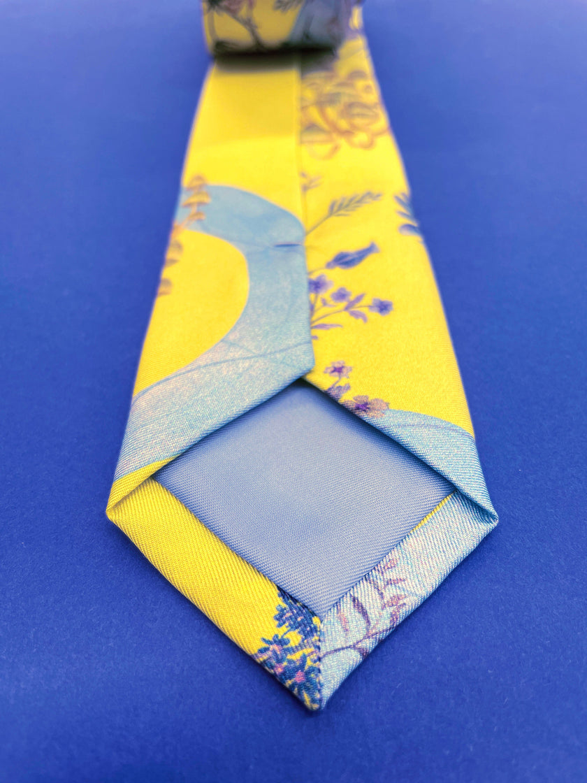 Vibrant yellow and pale blue ‘Luciferin’ floral silk tie