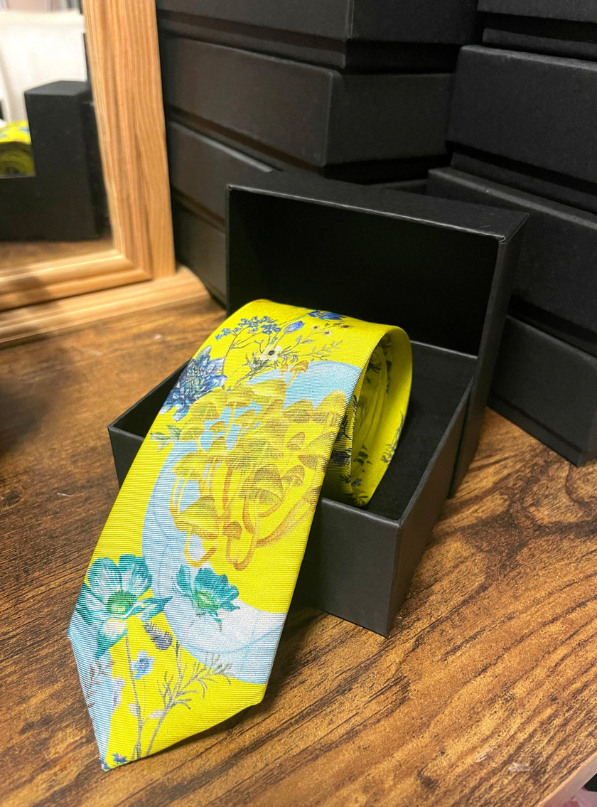 Vibrant yellow and pale blue ‘Luciferin’ floral silk tie