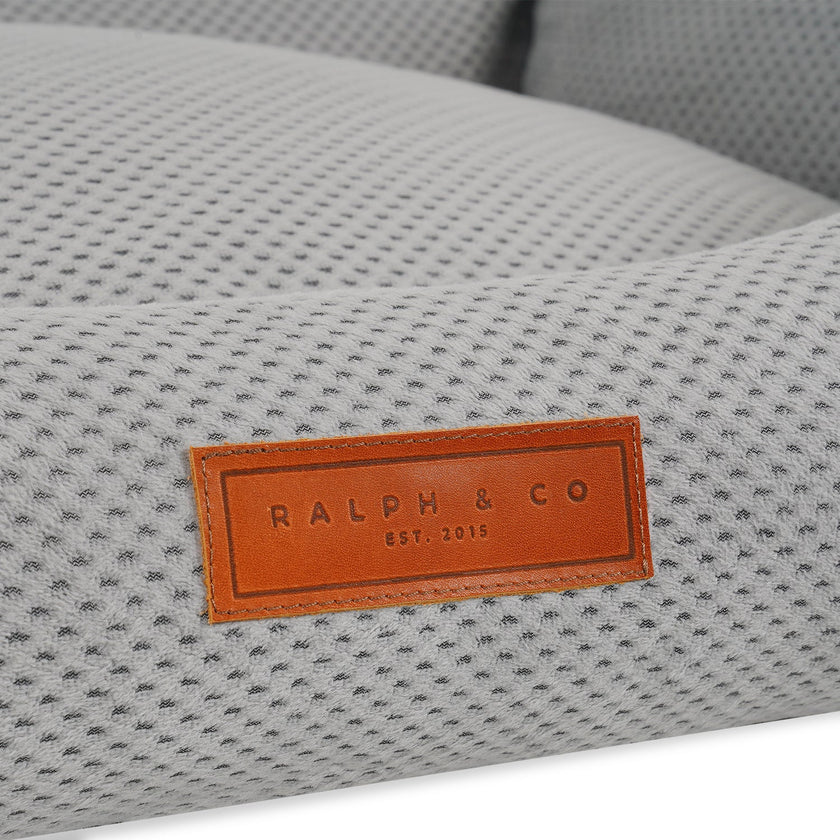 THE HIGHCLERE | LUXUS-HUNDEBETT MIT VISCOSCHAUM UND NACKENROLLE