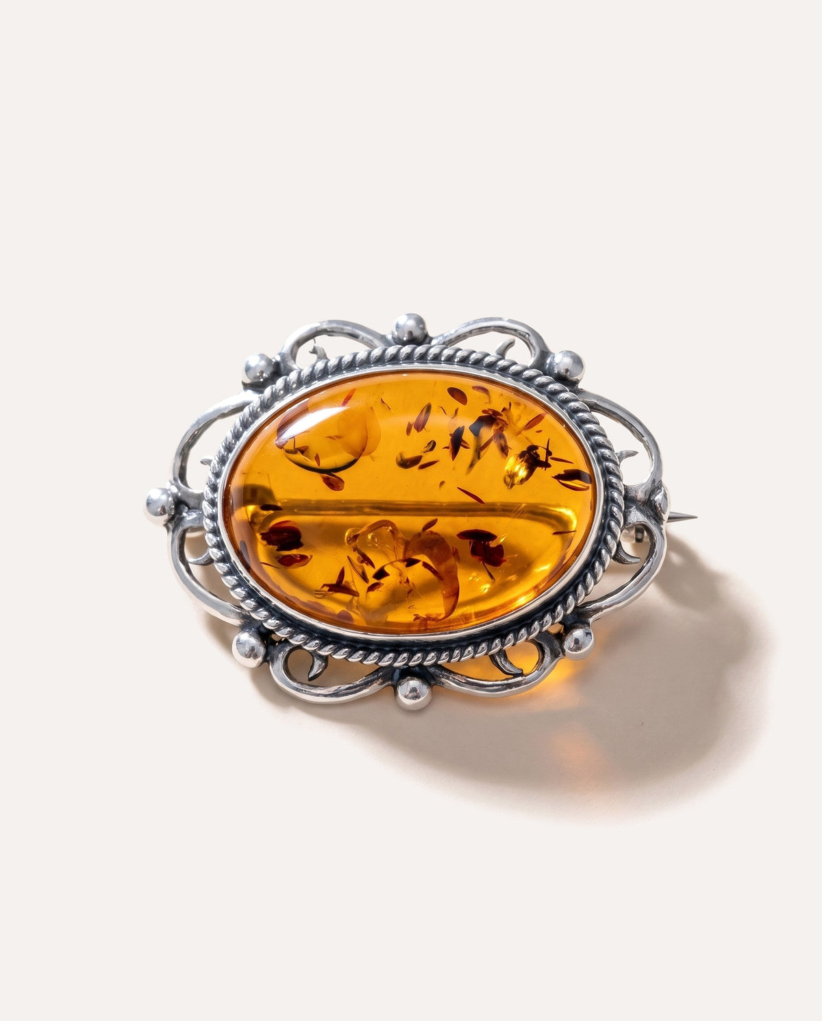 Oval Classic Framed Amber Brooch