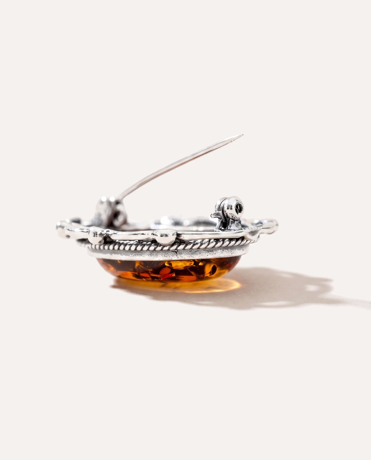 Oval Classic Framed Amber Brooch