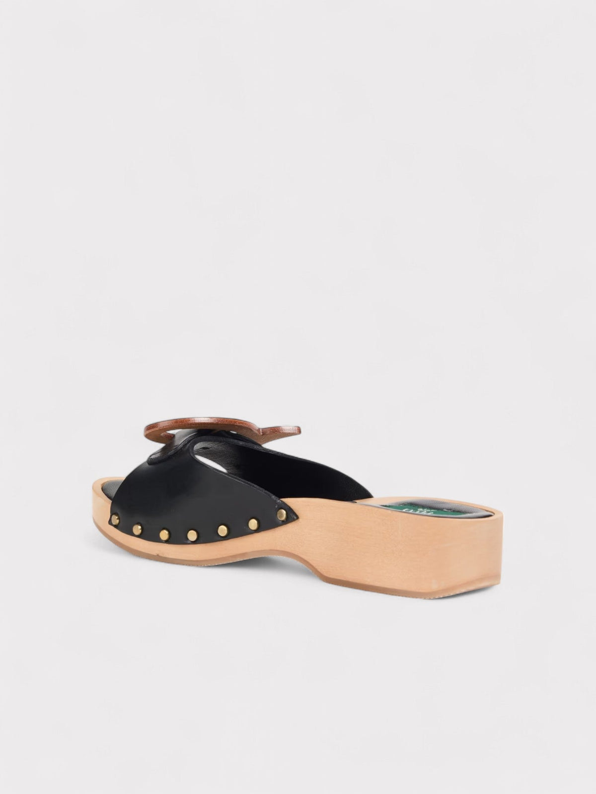 Pucci Zuecos de Piel con Apliques, Negros