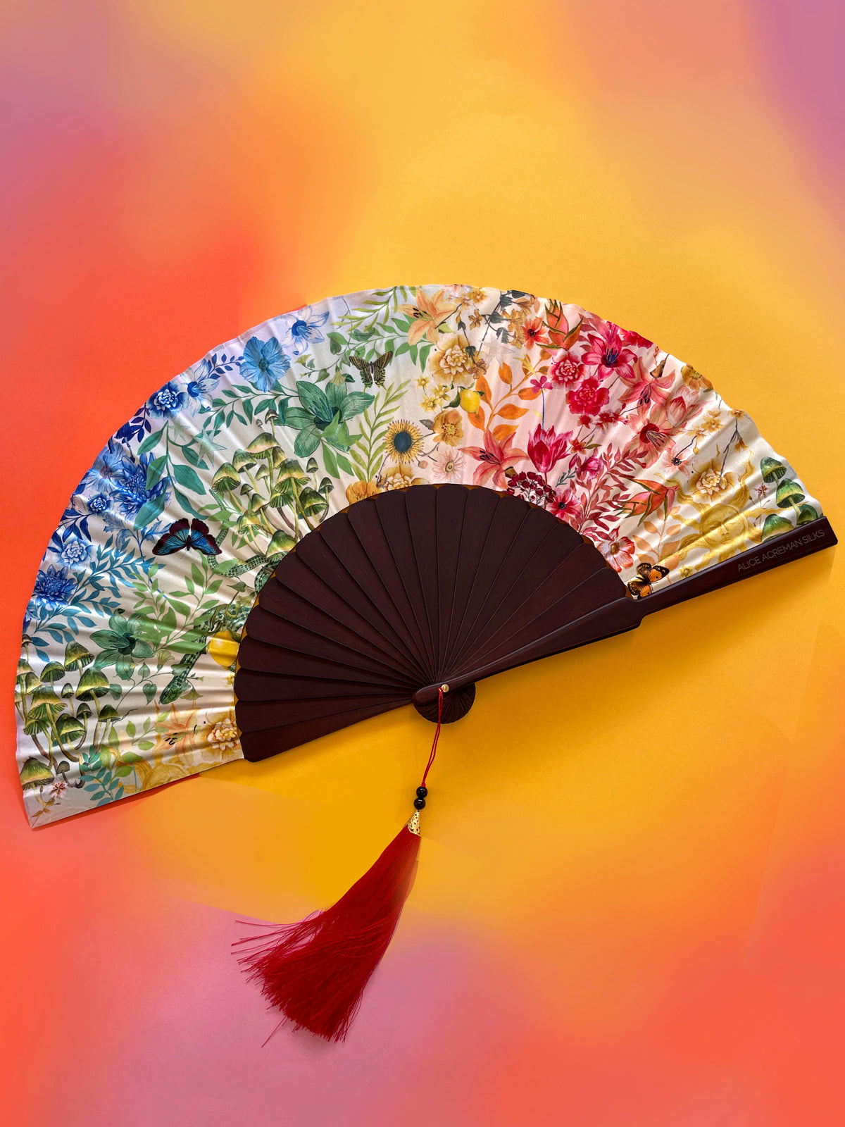 Colourful Silk folding hand fan 'kaleido-bloom' print with floral & nature filled rainbow design